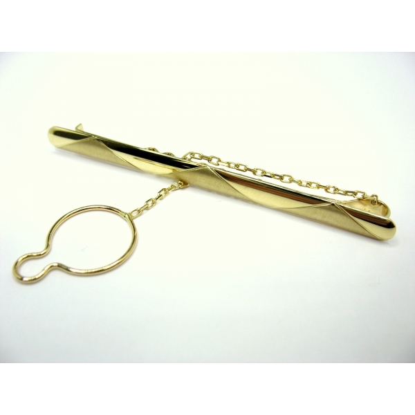 zlatá spona na kravatu